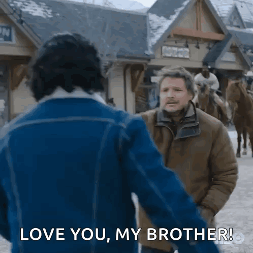 A Man In A Blue Jacket Is Holding The Hand Of Another Man In A Brown Jacket And Saying Love You My Brother . GIF