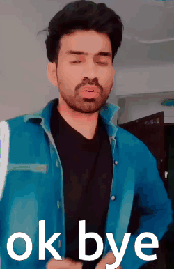 A Man In A Blue Jacket Says Ok Bye In White Letters GIF