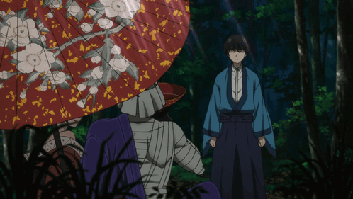 A Man In A Blue Kimono Stands In Front Of A Red Umbrella GIF