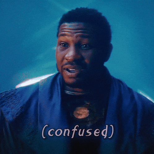 A Man In A Blue Robe With The Word Confused Written On The Bottom GIF