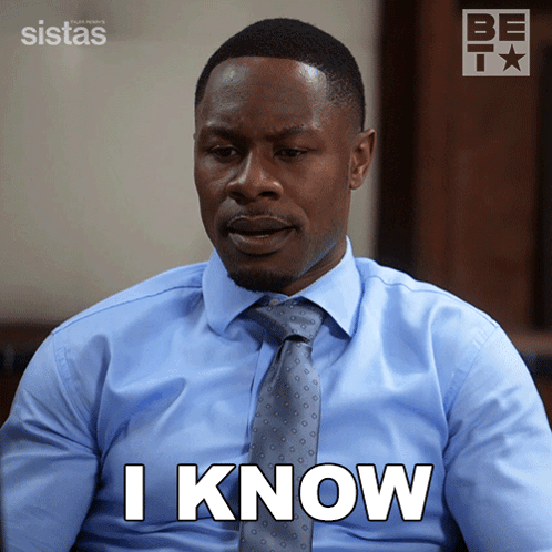 A Man In A Blue Shirt And Tie Has The Word I Know On His Face GIF