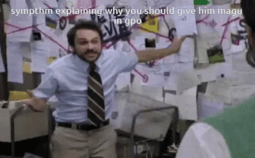 A Man In A Blue Shirt And Tie Is Standing In Front Of A Wall With Papers On It .. GIF