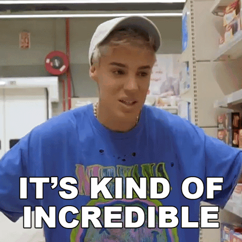 A Man In A Blue Shirt And White Hat Says It 'S Kind Of Incredible . GIF