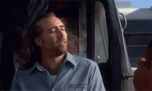 A Man In A Blue Shirt Has The Number 801027 On His Shirt . GIF