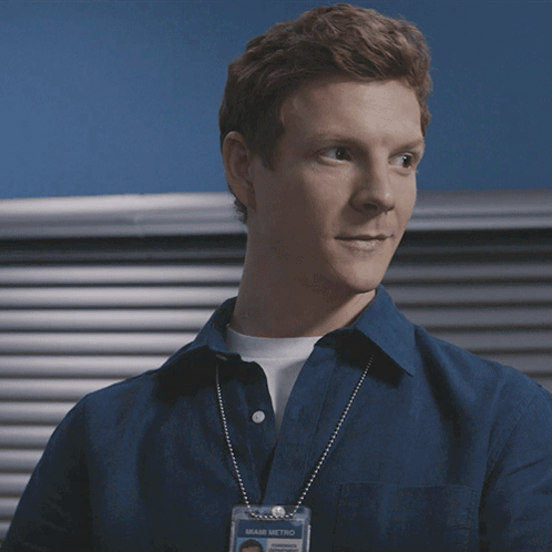 A Man In A Blue Shirt Has The Words " Do N't Be Nervous " On His Face GIF