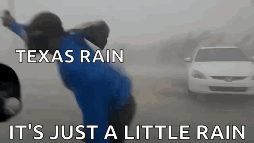 a man in a blue shirt is dancing in the rain with the words texas rain it 's just a little rain