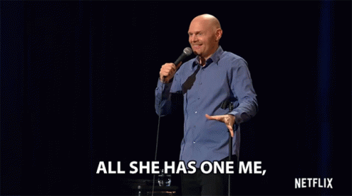 A Man In A Blue Shirt Is Holding A Microphone And Says " All She Has One Me " GIF