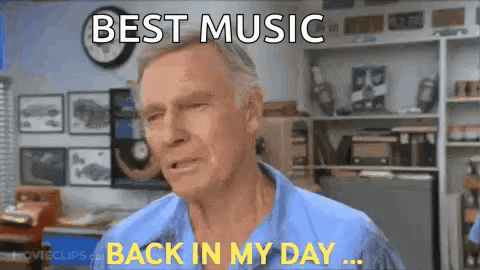 A Man In A Blue Shirt Is Making A Funny Face And Says `` Best Music Back In My Day ... '' GIF
