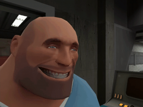 A Man In A Blue Shirt Is Sitting In A Chair Talking To Another Man GIF