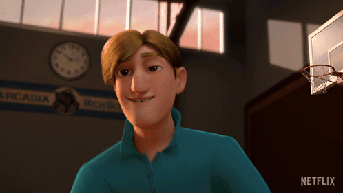 A Man In A Blue Shirt Is Smiling In Front Of A Sign That Says Arcadia On It GIF