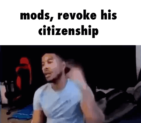 A Man In A Blue Shirt Is Standing In A Room With The Words `` Mods , Revoke His Citizenship '' . GIF