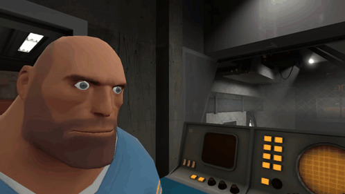 A Man In A Blue Shirt Is Standing In Front Of A Control Panel With The Number 17 On It GIF