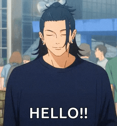 A Man In A Blue Shirt Is Standing In Front Of A Crowd And Saying `` Hello '' . GIF