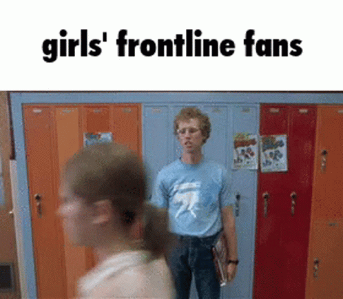 A Man In A Blue Shirt Is Standing In Front Of A Row Of Orange Lockers With The Words Girls ' Frontline Fans Above Him GIF