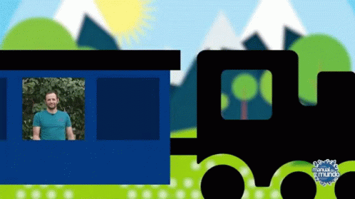 A Man In A Blue Shirt Is Standing In Front Of A Train That Says Manual Mundo GIF