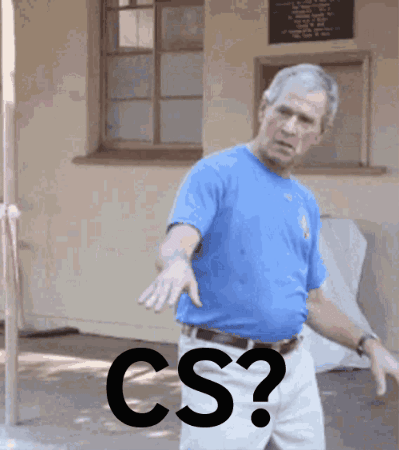 A Man In A Blue Shirt Is Standing In Front Of A Window With The Word Cs Written In Black GIF
