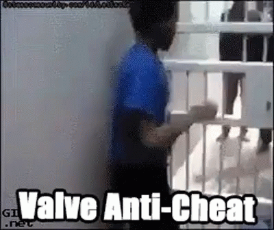 A Man In A Blue Shirt Is Standing Next To A Railing With The Words Valve Anti-Cheat On The Bottom GIF