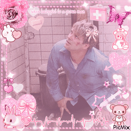 Man In Blue Shirt Surrounded By Pink Hearts GIF