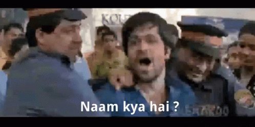 A Man In A Blue Shirt Is Surrounded By Police Officers And Shouting . GIF