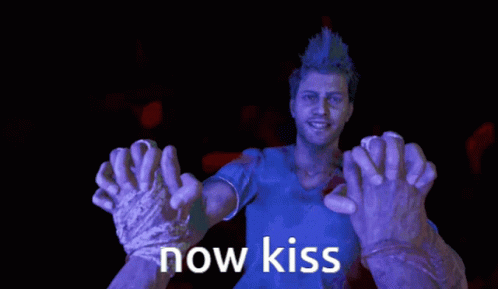 A Man In A Blue Shirt Is Surrounded By Purple Hands That Say " Now Kiss " GIF