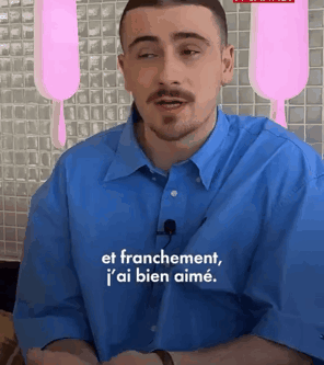 Man In Blue Shirt Speaking French GIF