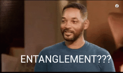 A Man In A Blue Shirt Says " Entanglement ?? " GIF