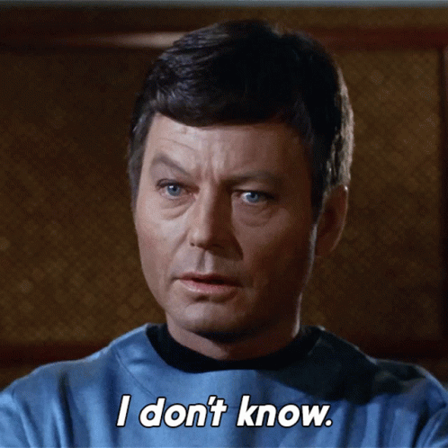 A Man In A Blue Shirt Says " I Don T Know " GIF