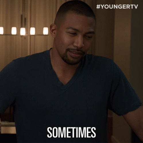 A Man In A Blue Shirt Says " Sometimes " In Front Of A Younger Tv Logo GIF