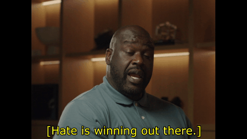 A Man In A Blue Shirt Says That Hate Is Winning Out There GIF