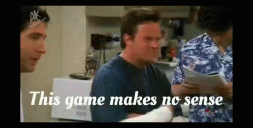 A Man In A Blue Shirt Says This Game Makes No Sense While Sitting In A Room With Other People . GIF