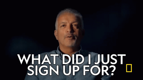 a man in a blue shirt says what did i just sign up for
