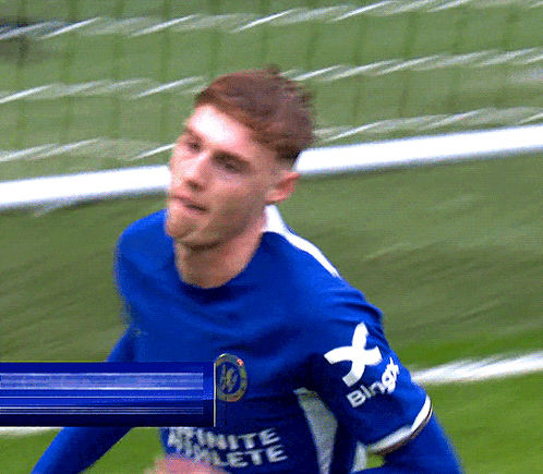 A Man In A Blue Shirt That Says Ultimate Athlete On It GIF