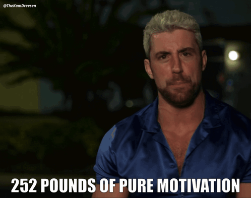 A Man In A Blue Shirt With 252 Pounds Of Pure Motivation Written Above Him GIF