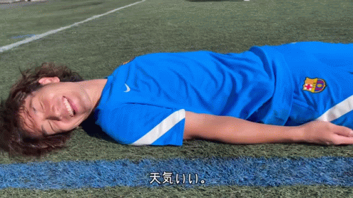 A Man In A Blue Shirt With A Fcb Logo On It GIF