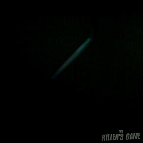 A Man In A Blue Shirt With The Killer 'S Game Written On The Front GIF