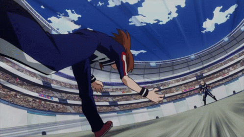 A Man In A Blue Shirt With The Letter X On It Is Running In A Stadium GIF