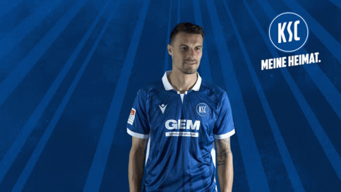 A Man In A Blue Shirt With The Word Gem On The Front GIF