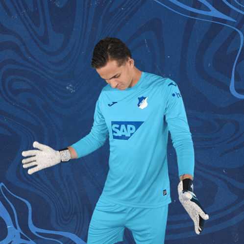 a man in a blue shirt with the word sap on the front