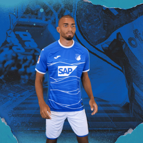 a man in a blue shirt with the word sap on the front