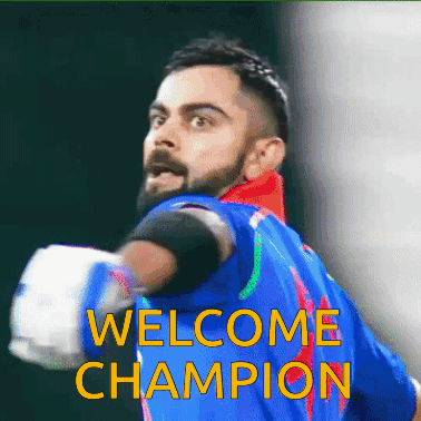A Man In A Blue Shirt With The Words Welcome Champion Written On It GIF