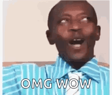 A Man In A Blue Striped Shirt And Tie Is Making A Funny Face And Saying `` Omg Wow '' . GIF