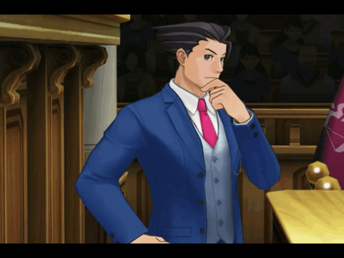 A Man In A Blue Suit And Pink Tie Is Standing In A Courtroom GIF