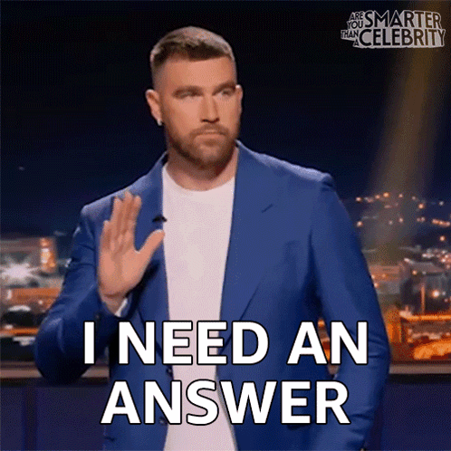 A Man In A Blue Suit And White Shirt Says I Need An Answer GIF