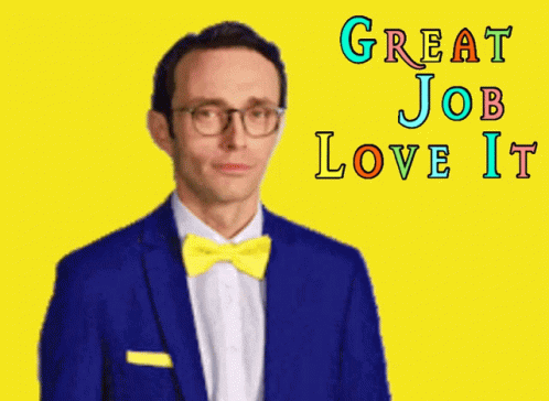 A Man In A Blue Suit And Yellow Bow Tie Giving The Middle Finger With The Words Great Job Love It Behind Him GIF