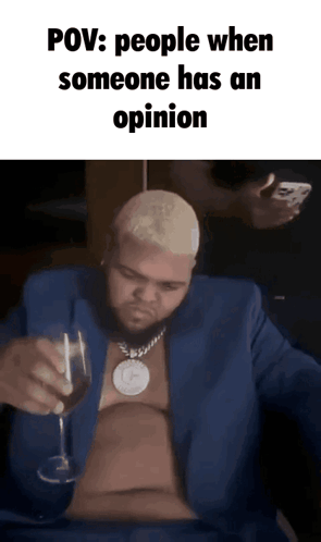 A Man In A Blue Suit Is Holding A Glass Of Wine With The Caption Pov : People When Someone Has An Opinion GIF