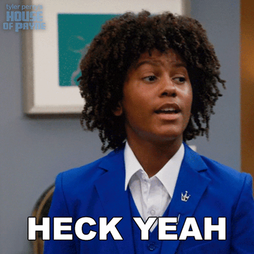 A Man In A Blue Suit Is Saying Heck Yeah GIF