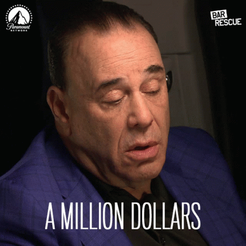 A Man In A Blue Suit Says " A Million Dollars " In Front Of A Paramount Network Logo GIF