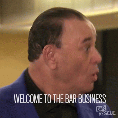 a man in a blue suit says welcome to the bar business bar rescue