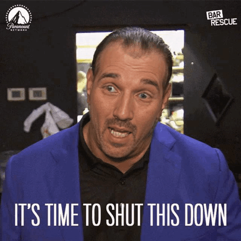 A Man In A Blue Suit With The Words It 'S Time To Shut This Down Below Him GIF