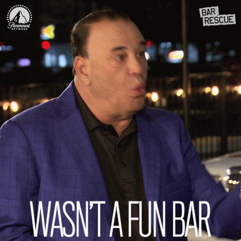 A Man In A Blue Suit With The Words Wasn T A Fun Bar GIF